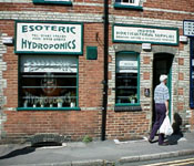 The outside of Esoteric Hydroponics in Martyr Road, Guildford and some old geezer carrying his shopping home from Sainsbury.